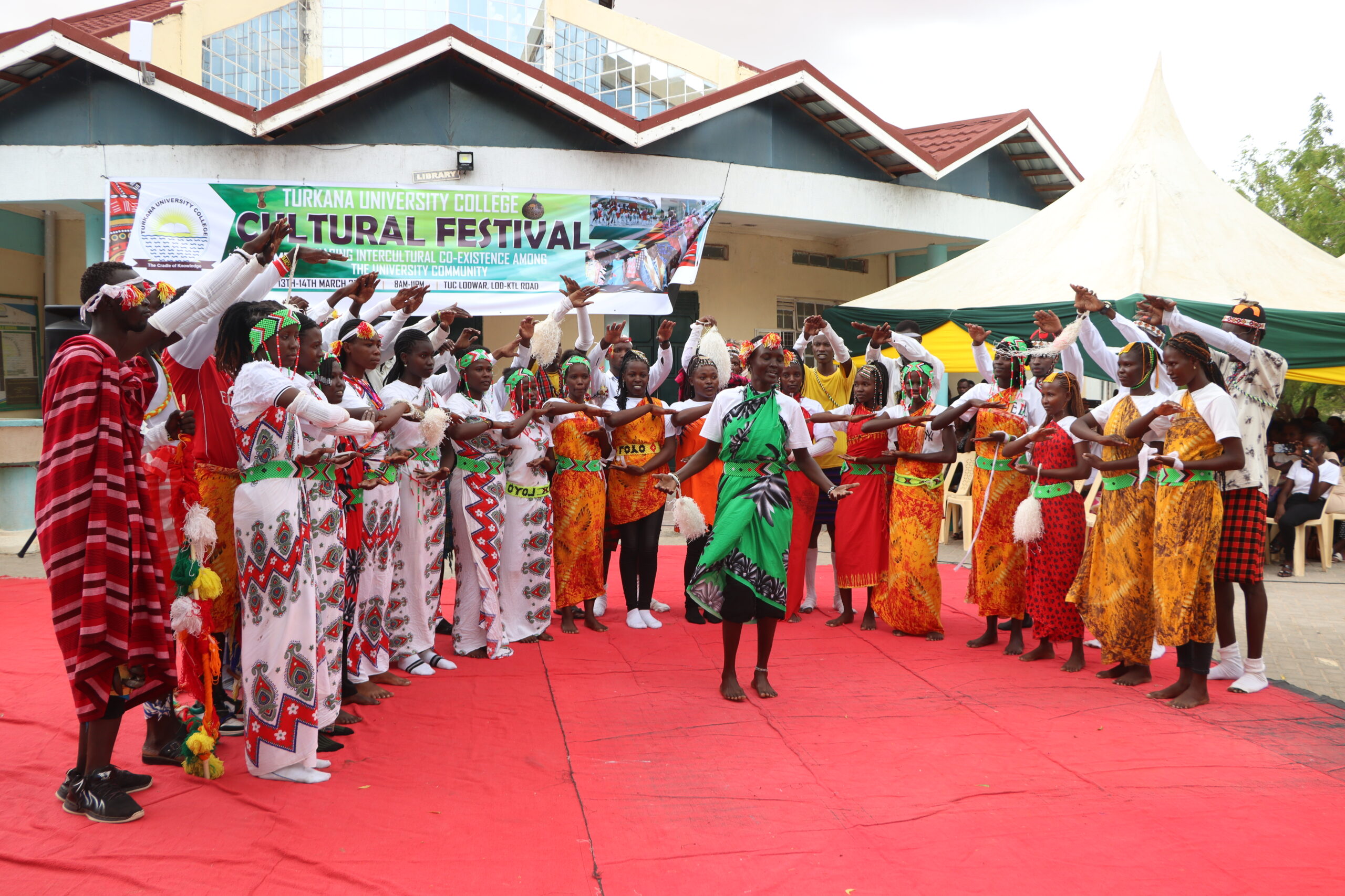 Students performing a folk song during the cultural festival at Turkana University College