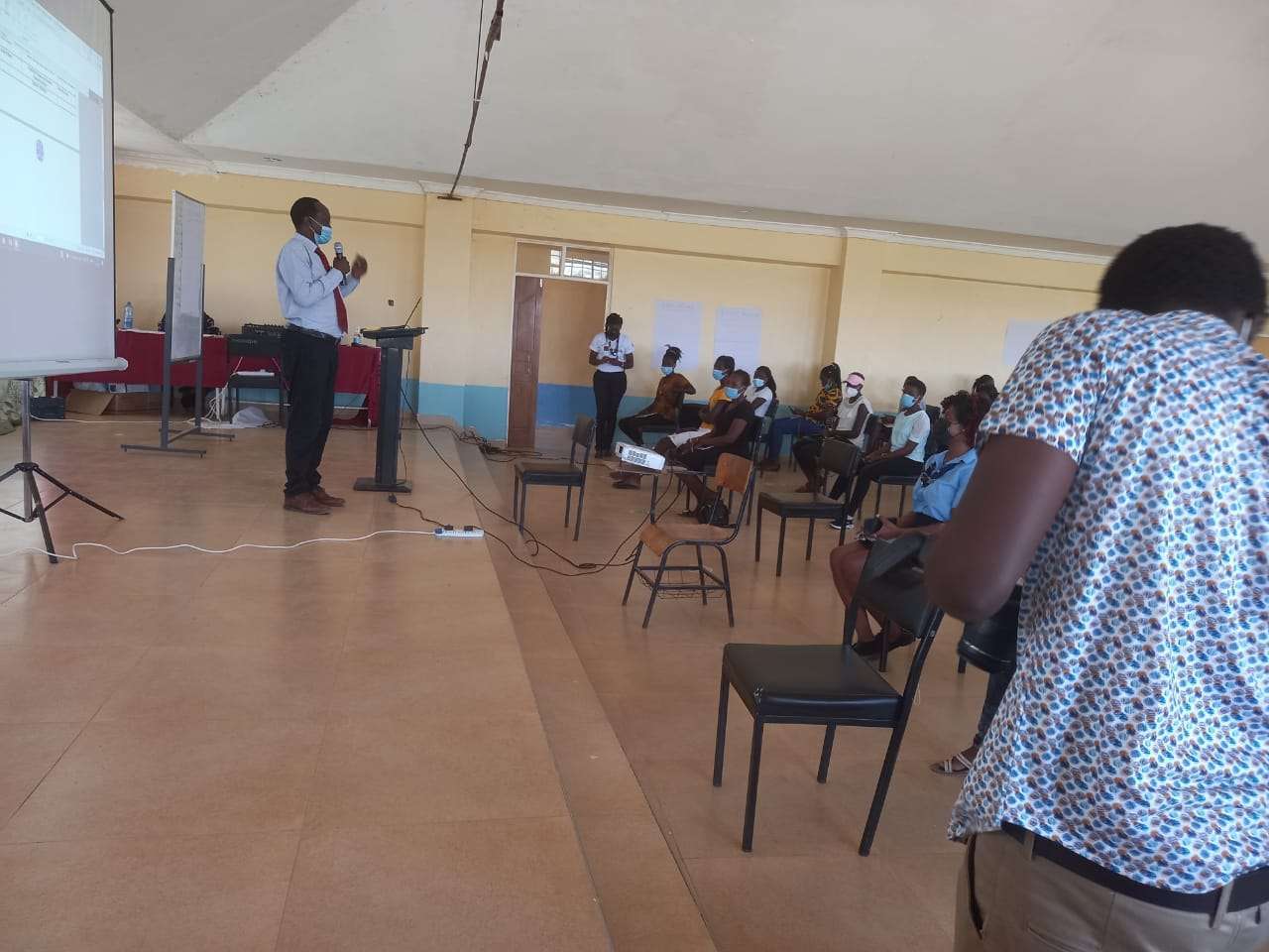 A presentation session in a College hall