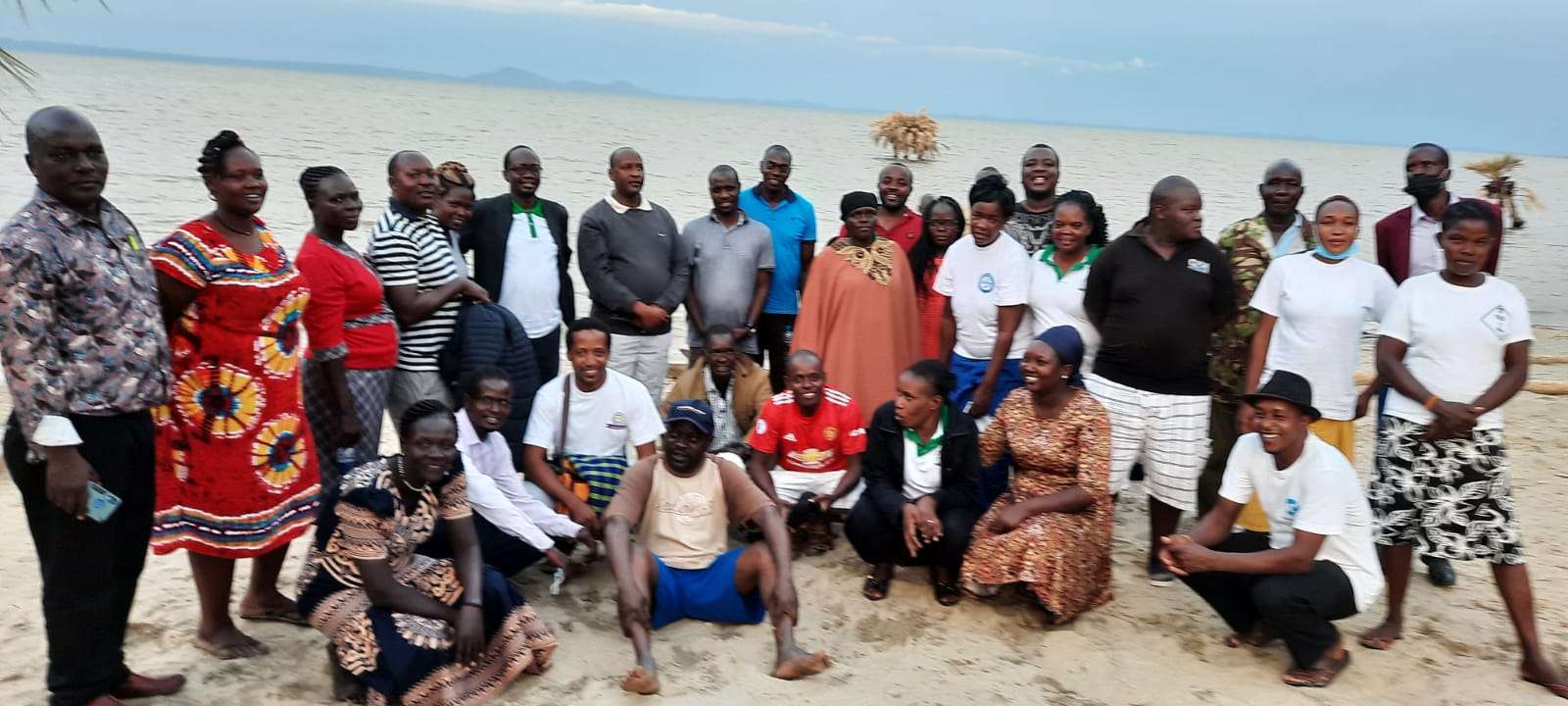 College staff on a field visit at the lake shore