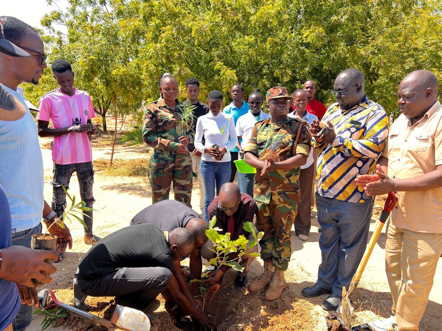 Tree-planting exercise with students and partners